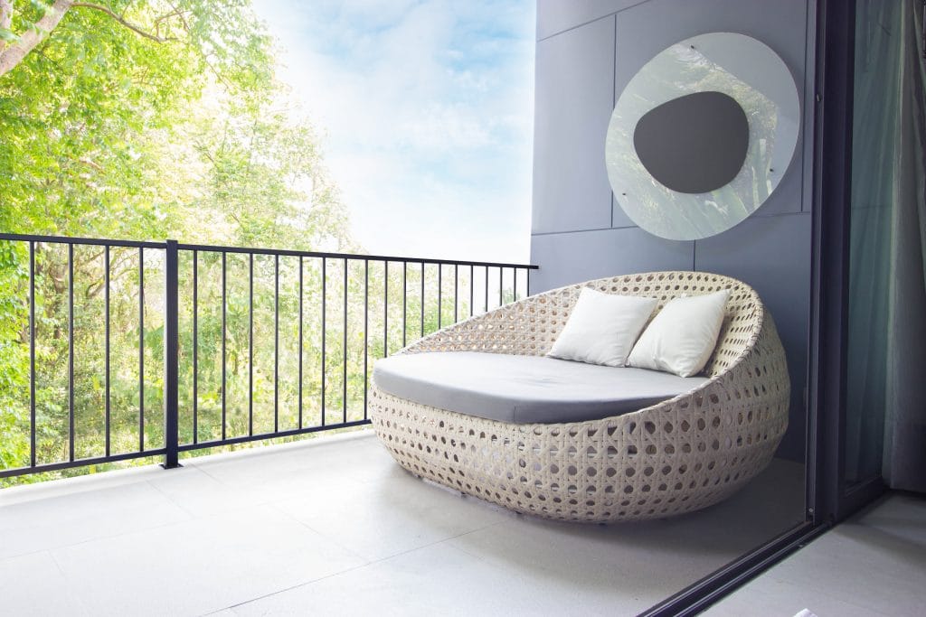 Sofa,on,the,balcony,with,garden,view.